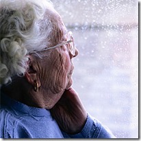 old woman looking out window